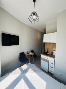 Kuchyňa alebo kuchynka v ubytovaní Property Apart - Ruska Centrum