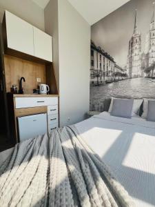 Posteľ alebo postele v izbe v ubytovaní Property Apart - Ruska Centrum