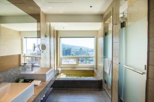 Ένα μπάνιο στο Kilin Hotel, JiaoXi