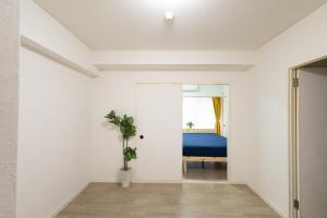 Postel nebo postele na pokoji v ubytování LN08 三宮14名まで宿泊可能な三宮元町駅至近貸切3LDKroom