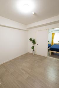 Postel nebo postele na pokoji v ubytování LN08 三宮14名まで宿泊可能な三宮元町駅至近貸切3LDKroom