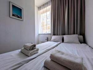 Posteľ alebo postele v izbe v ubytovaní Mazowiecka 11 by Homeprime