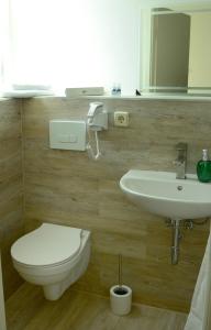 Koupelna v ubytování Hotel Allegro Due