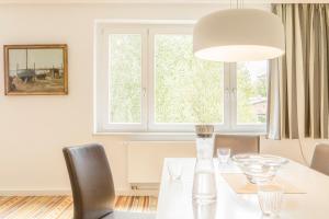 Posezení v ubytování Apartment Premium family im Gustav Seitz Gästehaus + 15 fotografií