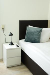 Postel nebo postele na pokoji v ubytování Hotel Allegro Due