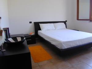Katil atau katil-katil dalam bilik di Appartamento Markus By La Via Del Mare Viaggi e Vacanze