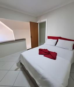 Ένα ή περισσότερα κρεβάτια σε δωμάτιο στο Apartamento Vila Velha