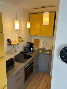 Køkken eller tekøkken på Kurhotel Schluchsee Apartment 2411