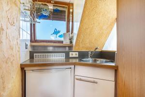 Dapur atau dapur kecil di Ferienhaus Appelgarten +28 gambar