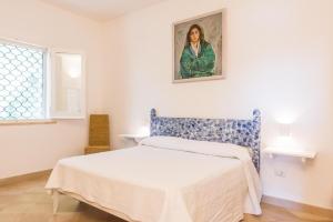 A bed or beds in a room at Adriatic villa