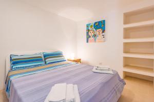 A bed or beds in a room at Adriatic villa