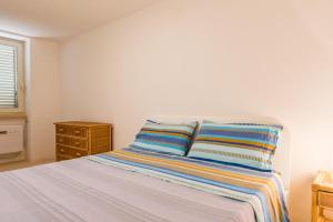 A bed or beds in a room at Adriatic villa