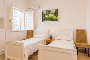 A bed or beds in a room at Adriatic villa