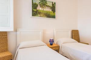 A bed or beds in a room at Adriatic villa Még 37 kép