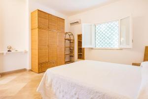 A bed or beds in a room at Adriatic villa