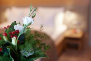 Posteľ alebo postele v izbe v ubytovaní Hotel Post Gries