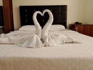 Postel nebo postele na pokoji v ubytování BALŞEN HOTEL