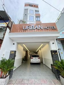 a car is parked in the garage of a hotel at Urban Hotel in Ho Chi Minh City