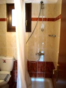 A bathroom at Enalion Hotel