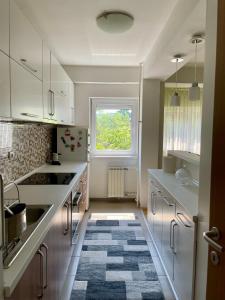 Η κουζίνα ή μικρή κουζίνα στο Maria Charming Apartment