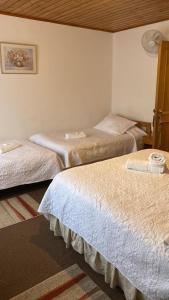 Postel nebo postele na pokoji v ubytování Hotel Küyen-Ko Pucón