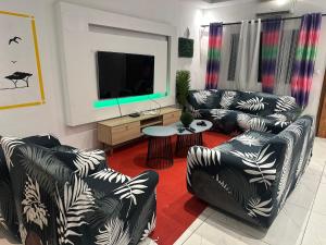 Khu vực ghế ngồi tại villa avec piscine