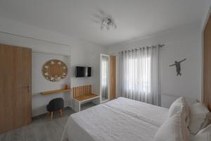 Ένα ή περισσότερα κρεβάτια σε δωμάτιο στο Marvarit Villas +47 φωτογραφίες