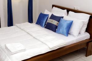 Giường trong phòng chung tại villa avec piscine +4 ảnh