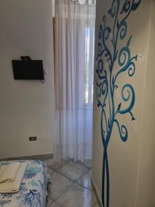 TV a/nebo společenská místnost v ubytování B&B Casa Roel