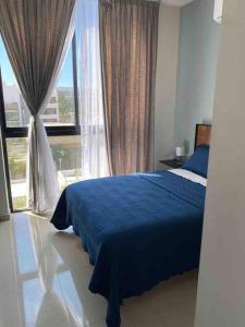 Katil atau katil-katil dalam bilik di Impecable loft, terraza, alberca, cerca de playa