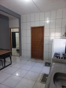 Kuchyň nebo kuchyňský kout v ubytování Conforto Alternativo