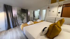 Uma cama ou camas num quarto em Truly Verona