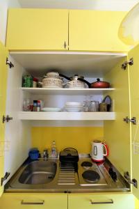 a kitchen with a sink and a counter top at Apartment Garden M&M in Dubrovnik +48 photos