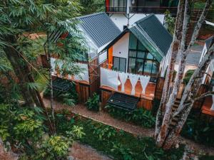 an aerial view of a house in the forest at Chertarn Homestay in Ban Pang Bo Hu Bon