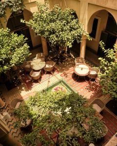 Ein Garten an der Unterkunft Marrakech Riads, Angsana Heritage Collection