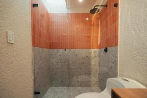 Vannituba majutusasutuses Hotel Boutique Roomzz Laureles