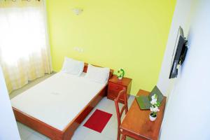 Postel nebo postele na pokoji v ubytování Stella Maris Hotel
