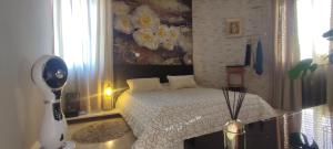 A bed or beds in a room at Квартира люкс в Милане (Appartamento di lusso a Milano)