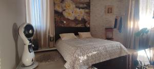 A bed or beds in a room at Квартира люкс в Милане (Appartamento di lusso a Milano)