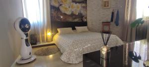 A bed or beds in a room at Квартира люкс в Милане (Appartamento di lusso a Milano)