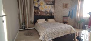 A bed or beds in a room at Квартира люкс в Милане (Appartamento di lusso a Milano)