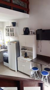 Η κουζίνα ή μικρή κουζίνα στο Lindo Studio em Maresias +5 φωτογραφίες