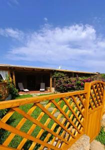 Φωτογραφία από το άλμπουμ του Appartamento vicino al mare con giardino e veranda σε Proiettore