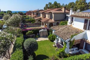 an aerial view of a house with a yard at Villa Letizia Santa Luria Sea View - IUN R9232 in Quartu SantʼElena