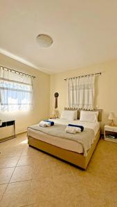 a large bedroom with a large bed in a room at Sea House Lahania in Lachania