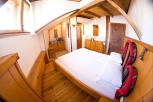 Cama o camas de una habitación en Dedo Pene Inn