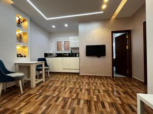 Kuchyň nebo kuchyňský kout v ubytování Sadam Luxury apartment