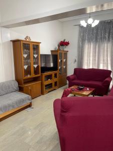 Posezení v ubytování Rooms fbΓιώργος Πιπερης + 13 fotografií