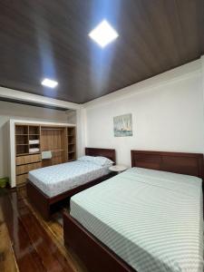 Postel nebo postele na pokoji v ubytování Casa vacional de playa Santorini