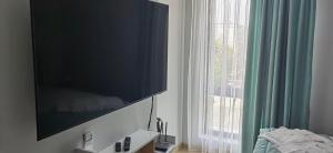 TV a/nebo společenská místnost v ubytování Apartmenthaus Oborishte - 17